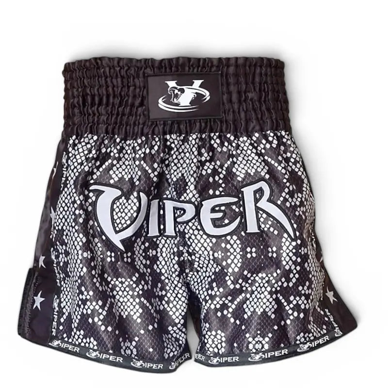 Black and white snake print Muay Thai shorts with 'VIPER' written in white across the front, a black elastic waistband, and a black brand patch on the front.
